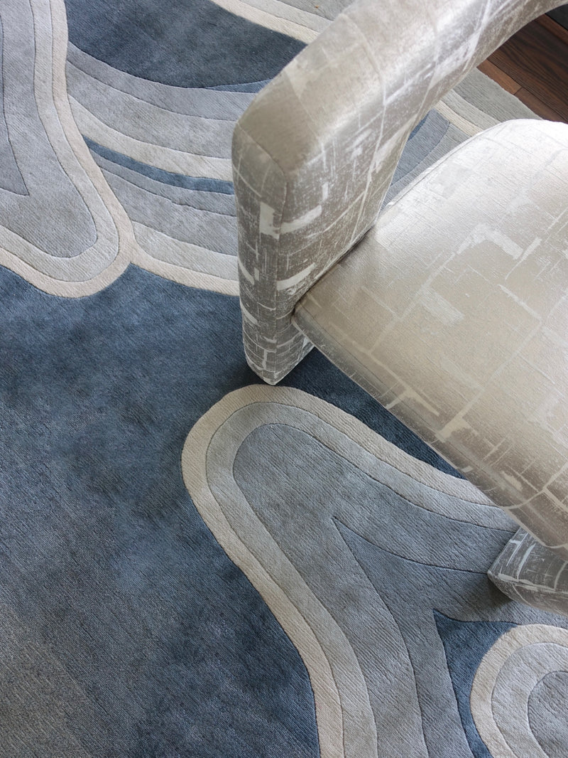 Naoshima rug from Meredith Heron Collection and Accent Chair Shades of Blue and silver grey